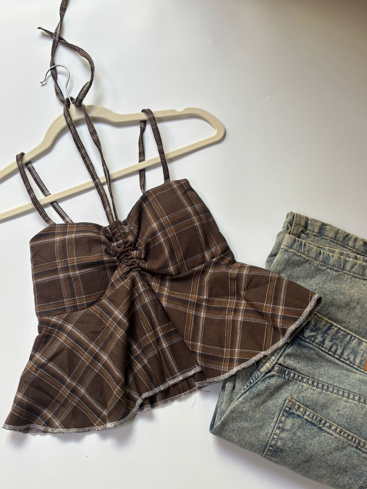 CHECK PEPLUM TOP